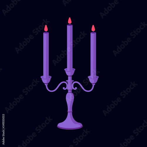 Burning candle in a candlestick on a dark background. Halloween Mysterious castle.
