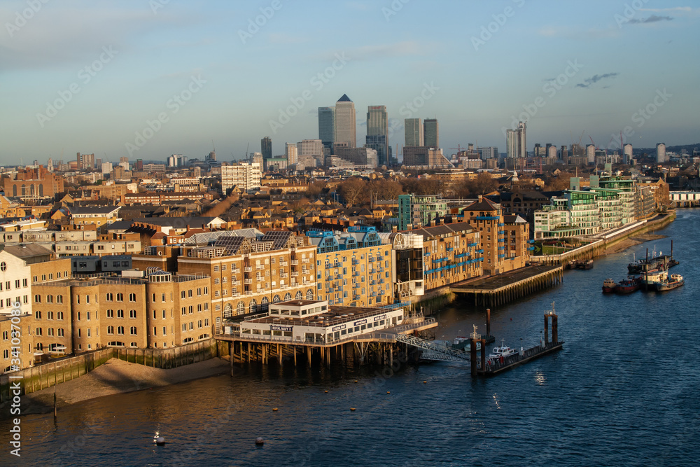 london city skyline with river and boats