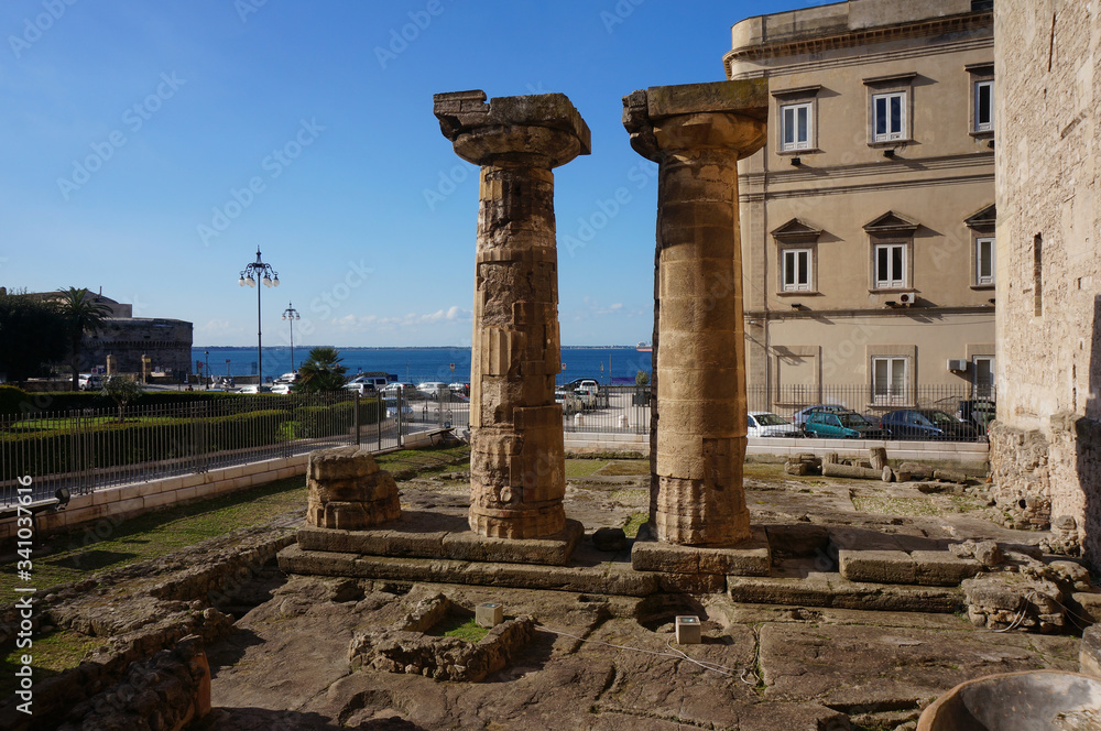 Doric columns of Temple of Poseidon. Old Town of Taranto, Italy.