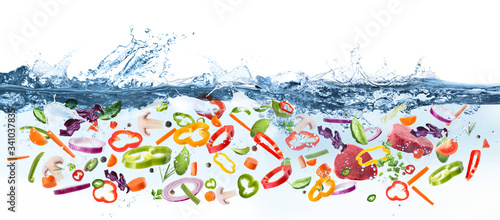 Many different ingredients in water with splashes. Banner design