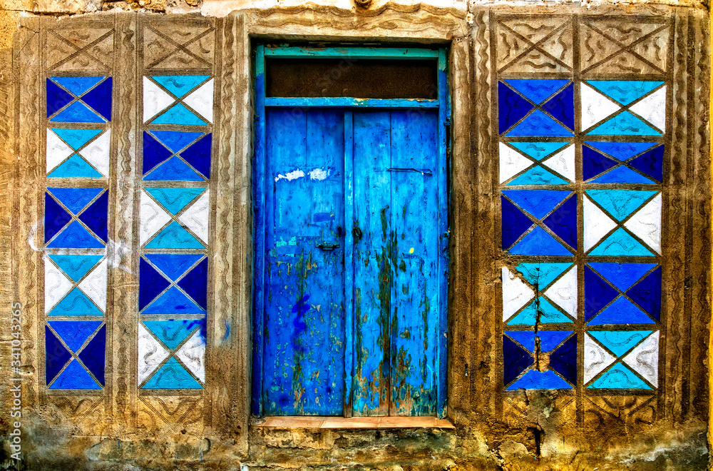 Fototapeta vintage rustic door with geometrical elements. retro background