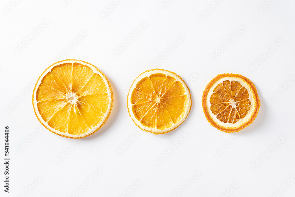 Dried citrus oranges on a light background Dried citrus oranges on a light background