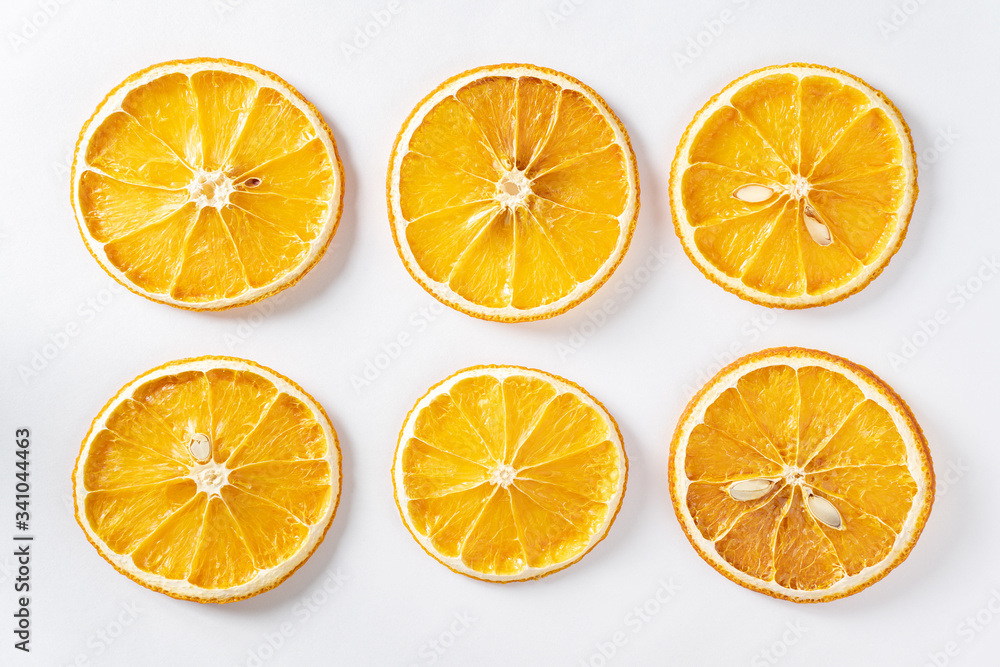 Pattern of dried citrus oranges on a light background