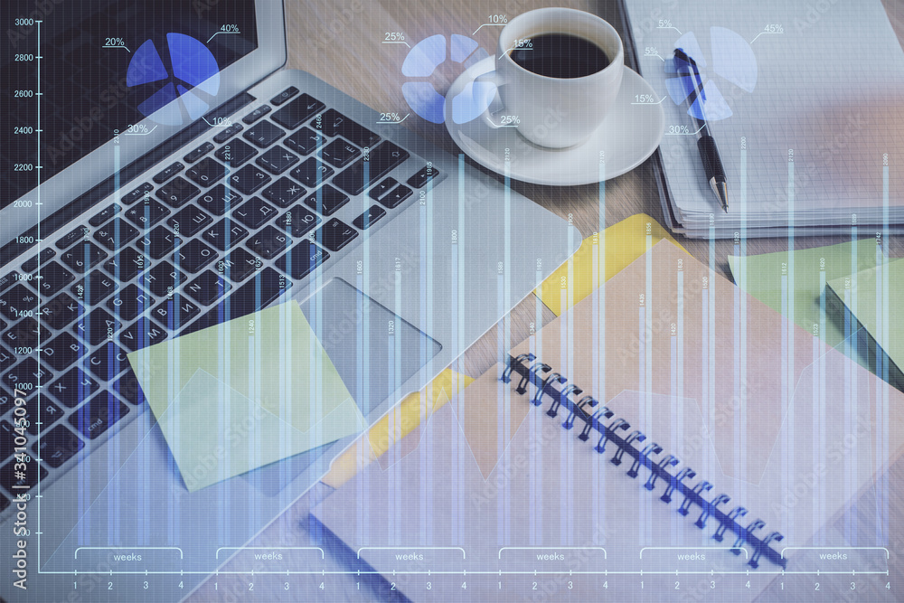Multi exposure of forex graph drawing and desktop with coffee and items on table background. Concept of financial market trading Multi exposure of forex graph drawing and desktop with coffee and items on table background. Concept of financial market trading