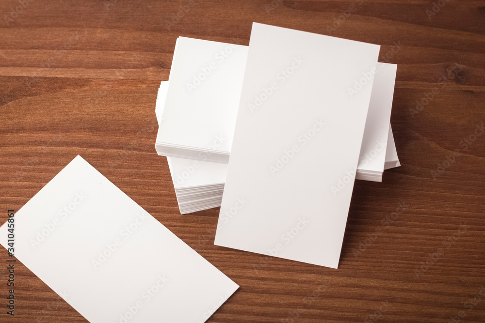 Business card template on a wooden table. business card for corporate identity presentation Business card template on a wooden table. business card for corporate identity presentation