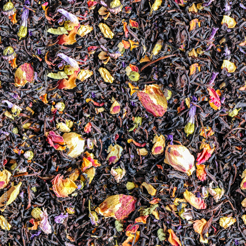 Background with dry black tea mixed with herbs and flowers. Seamless pattern.