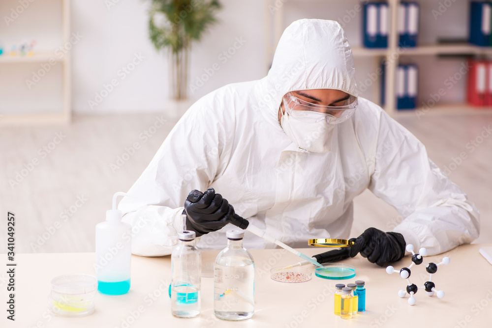 Doctor working in lab in coronavirus COVID-19 concept Doctor working in lab in coronavirus COVID-19 concept