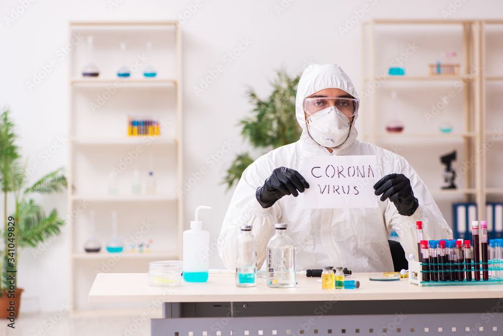Doctor working in lab in coronavirus COVID-19 concept Doctor working in lab in coronavirus COVID-19 concept