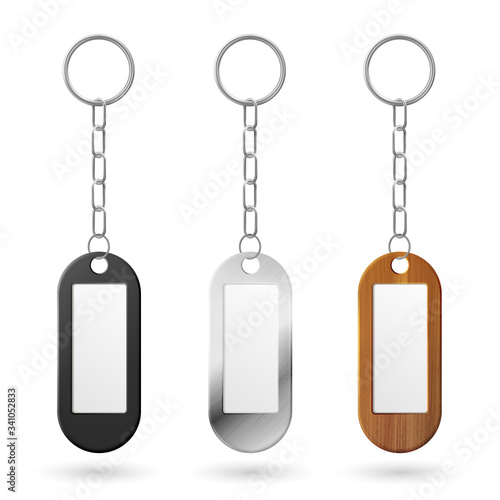 Keychain, holder trinket for key with metal chain and ring. Vector realistic template of black plastic, silver and wooden fobs with blank label for car, home or office key isolated on white background