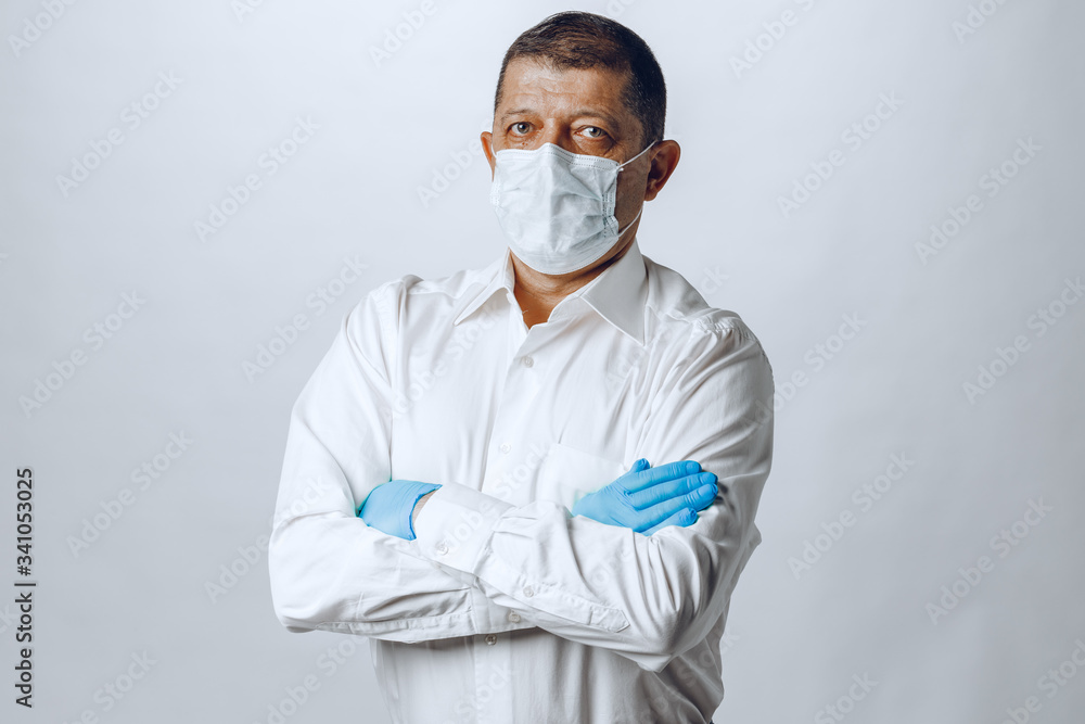 Old man wearing protective mask and gloves, close up. Old man wearing protective mask and gloves, close up.