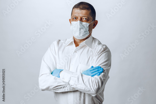 Old man wearing protective mask and gloves  close up.