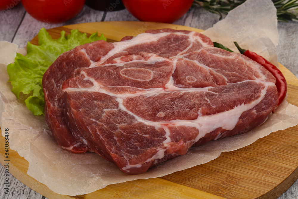 Raw pork neck steak