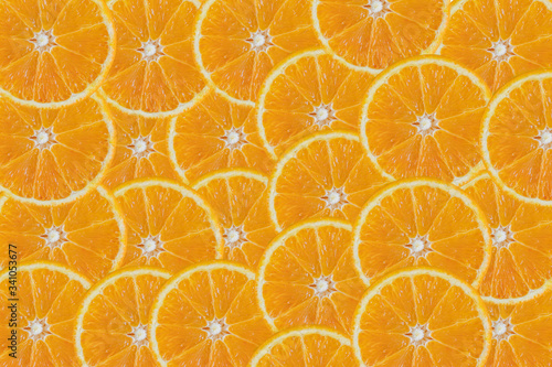 fresh and multiple orange sliced covered all the background