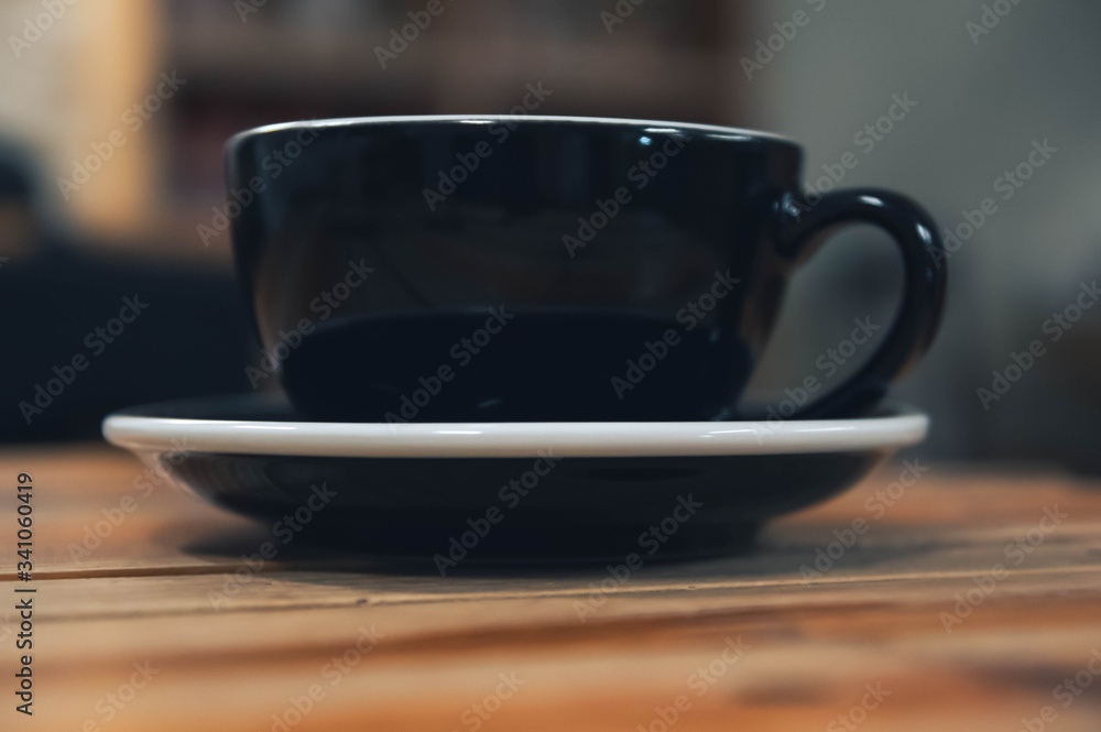 Fototapeta premium black coffee Cup photographed from the bottom.
