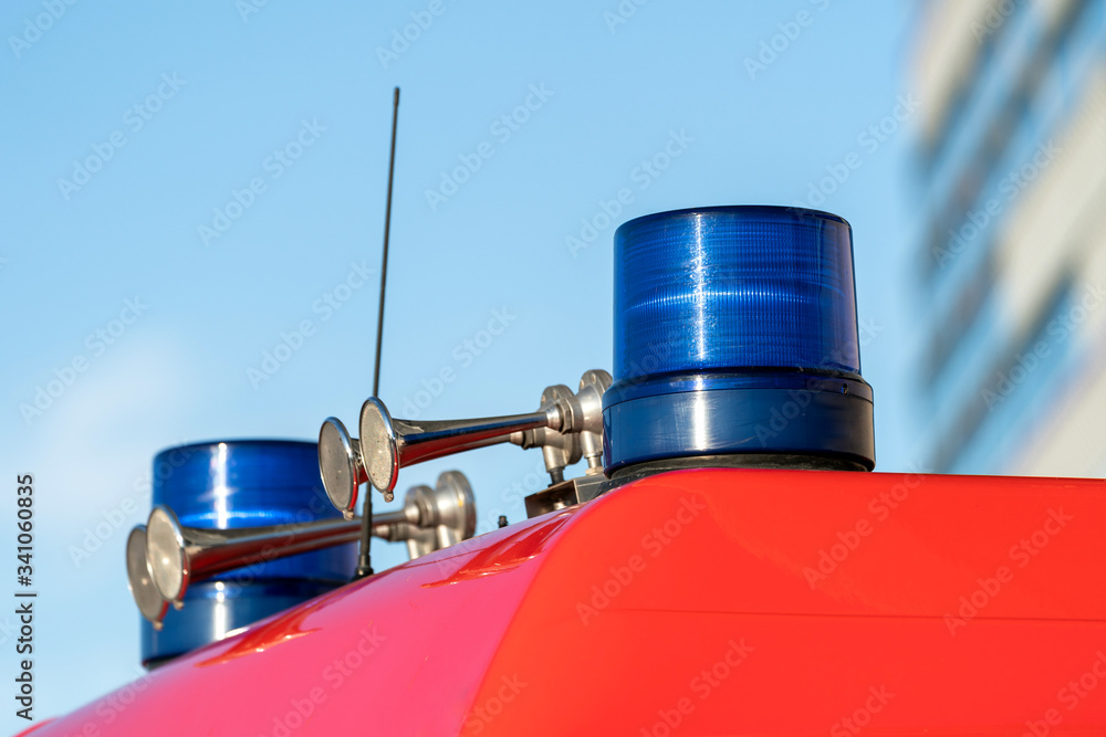 Flashing lights and signal horns on top of a fire truck Flashing lights and signal horns on top of a fire truck