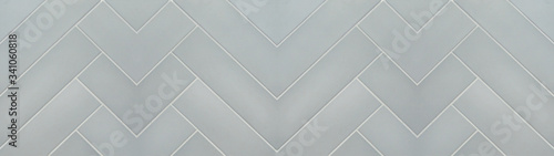 White gray geometric herringbone texture tiles background banner panorama long	
