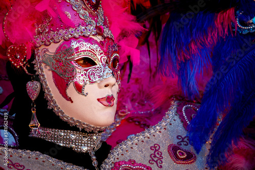 VENICE CARNIVAL: close-up of beautiful and colorful mask during the carnival.