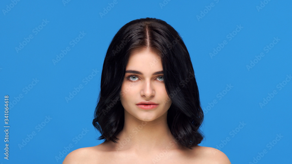 Studio portrait of young and beautiful brunette woman over background. Skin care, health, makeup and cosmetics. Studio portrait of young and beautiful brunette woman over background. Skin care, health, makeup and cosmetics.