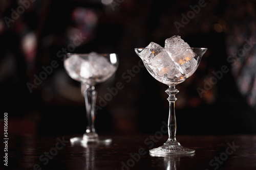 glasses of ice ready for serving cocktails
