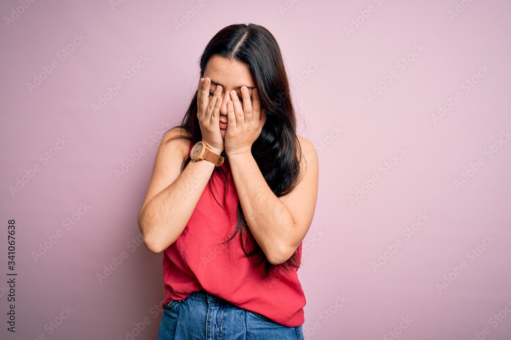 Young brunette woman wearing casual summer shirt over pink isolated background rubbing eyes for fatigue and headache, sleepy and tired expression. Vision problem Young brunette woman wearing casual summer shirt over pink isolated background rubbing eyes for fatigue and headache, sleepy and tired expression. Vision problem