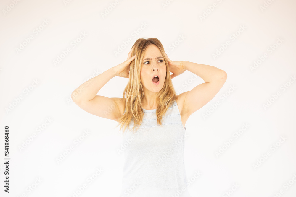 Beautiful woman with her hands in her hair Beautiful woman with her hands in her hair