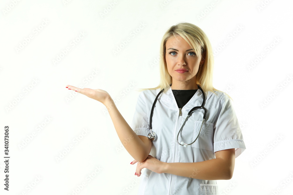 young female doctor with stethoscope raised her hand like holding something on white background young female doctor with stethoscope raised her hand like holding something on white background