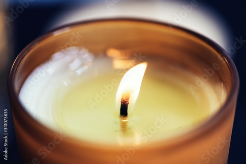 Closeup of lit candle