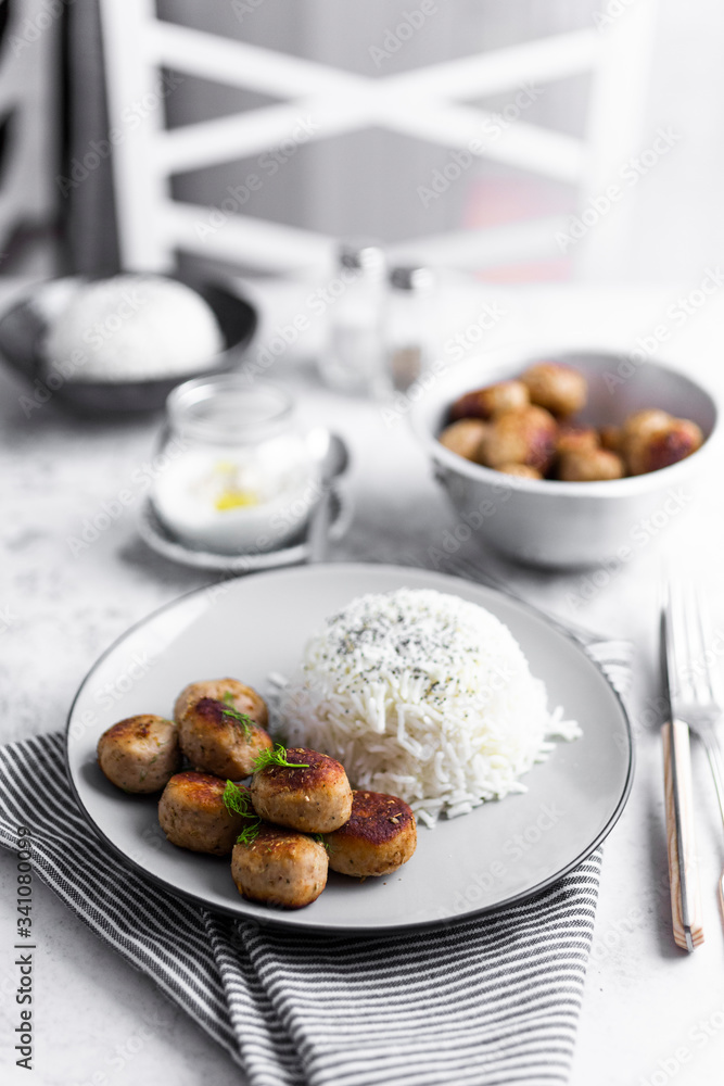 Plate of chicken meatballs with rice Plate of chicken meatballs with rice