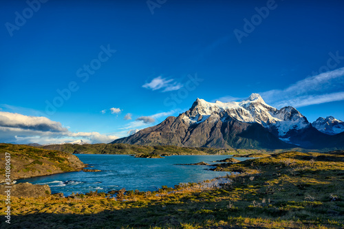 Chile, Ultima Esperanza Province, Blue sky over Nordenskjold Lake and Cerro Paine Grande at dawn photo