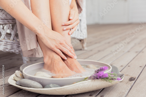 Close-up of woman having a footbath