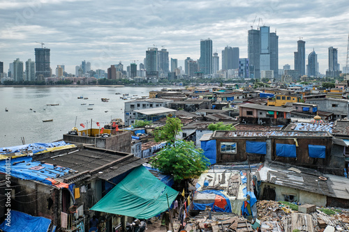 View of Mumbai skyline with skyscrapers over slums in Bandra suburb. Mumbai, Maharashtra, India