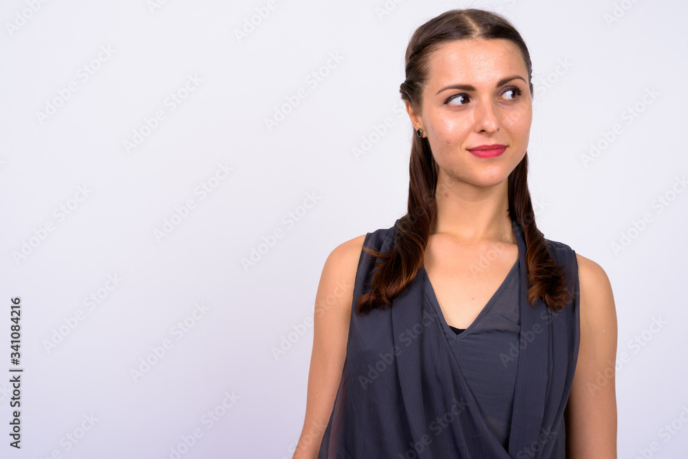 Portrait of young beautiful woman thinking and looking away Portrait of young beautiful woman thinking and looking away