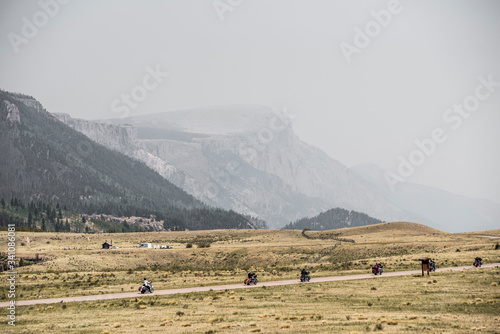motorcycle gang riding across the mountains of colorado