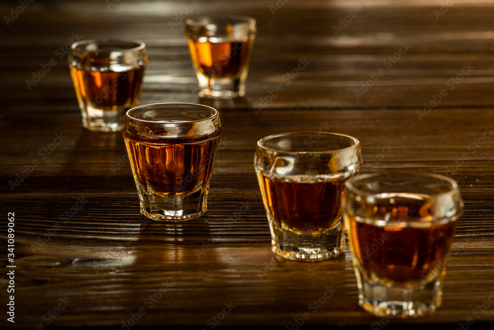 glasses with brandy on the table, strong alcoholic drinks glasses with brandy on the table, strong alcoholic drinks