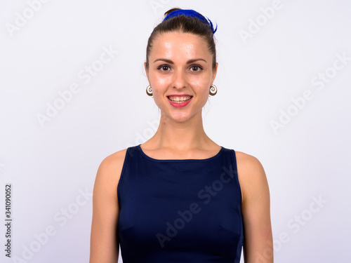 Portrait of happy young beautiful businesswoman smiling