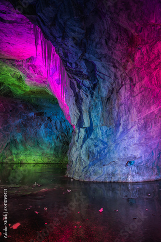 Colorful illumination of  Ruskeala caves  pink