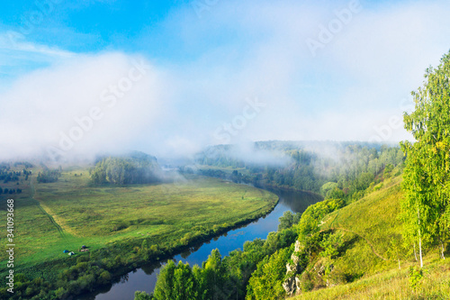 river and forest from a high hill on a summer morning © Alx_Yago