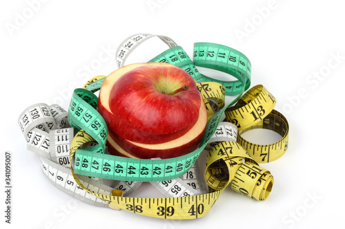 sliced red and green apple on white ground  photo