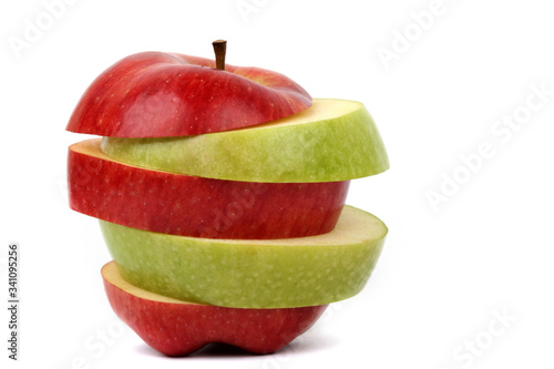 sliced red and green apple on white ground  photo