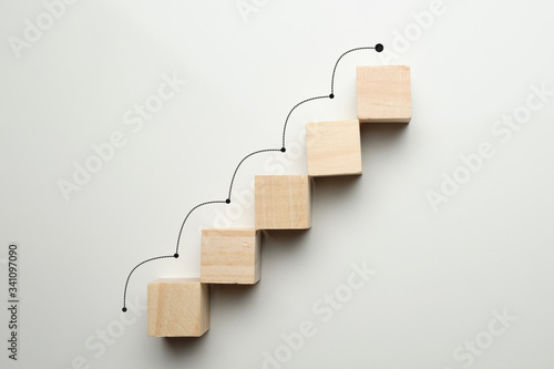 Canvas Print Growth concept by career ladder. Wooden cubes to the top.