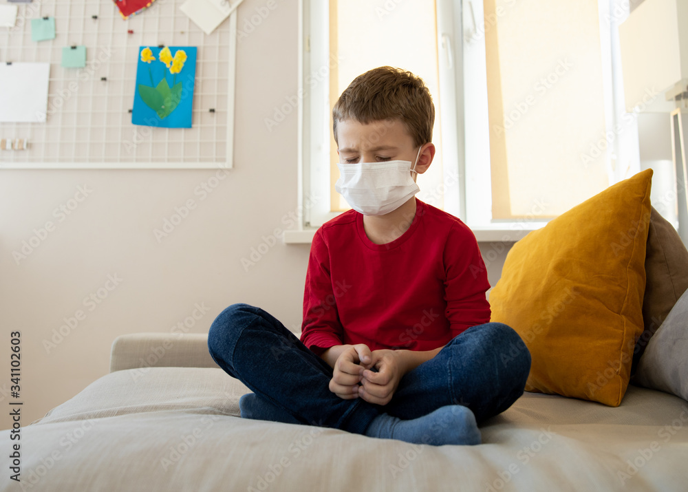 Little boy in mask tired of isolation period Little boy in mask tired of isolation period