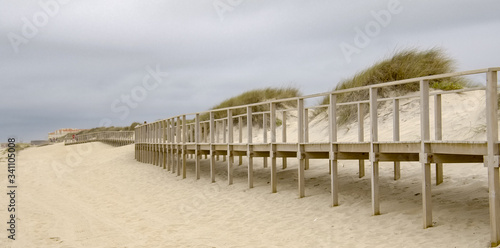 Pier over the dunes at the coast - travel photography