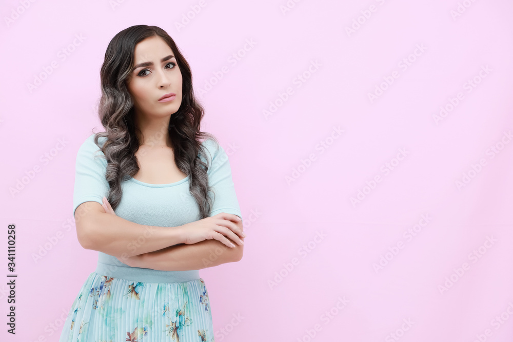Young woman over isolated pink background doing angry gesture Young woman over isolated pink background doing angry gesture