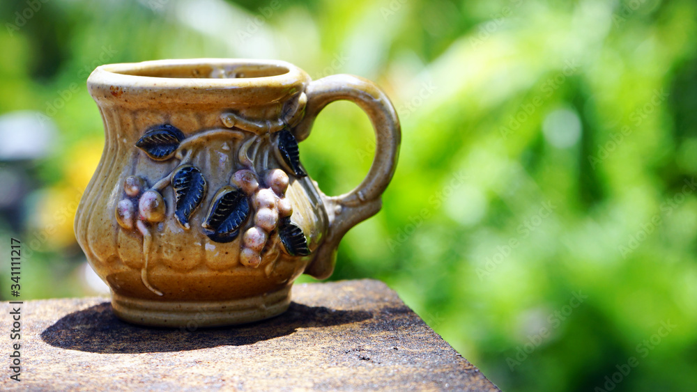 cup of coffee on wooden table cup of coffee on wooden table