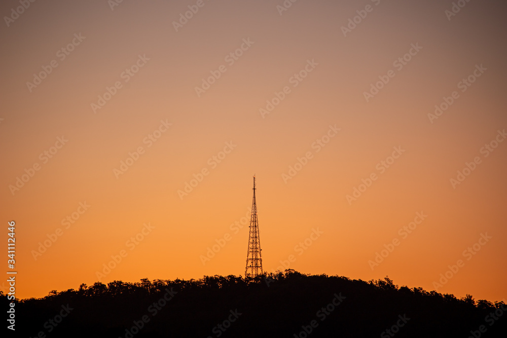Communication tower at sunset