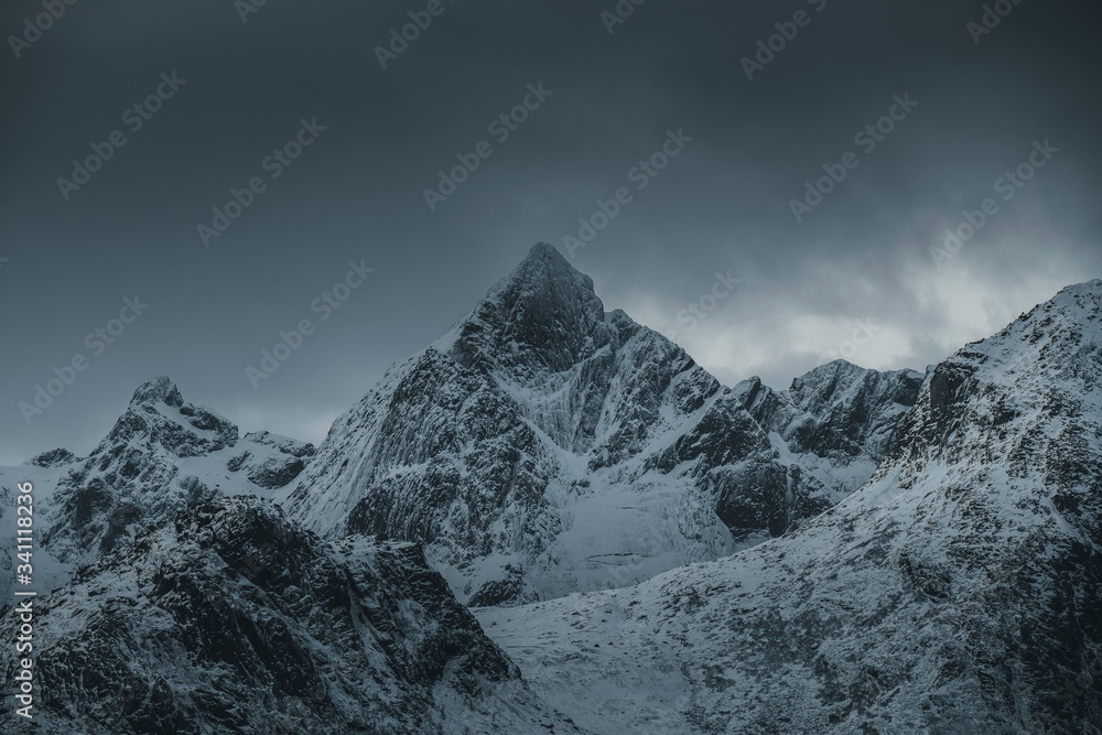 Fototapeta premium Snowy mountain peaks in Norway
