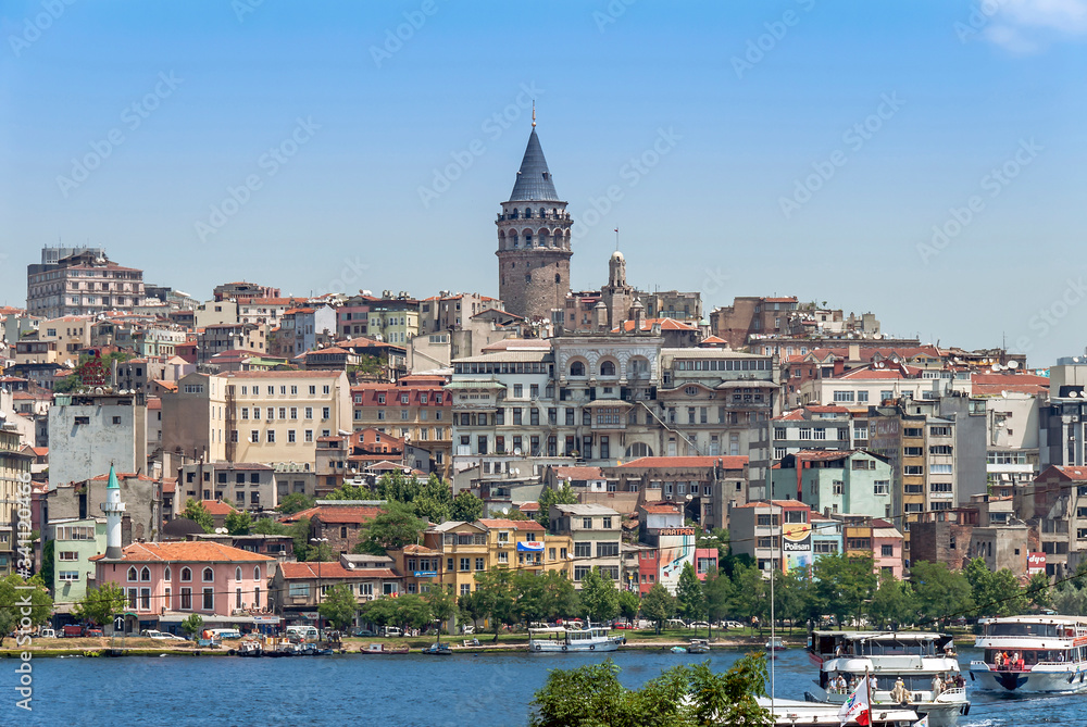 Beyoglu, Istanbul, Turkey, 22 June 2006: Galata Tower, City Lines Ferry, King of Byzantine Anastasius, 528