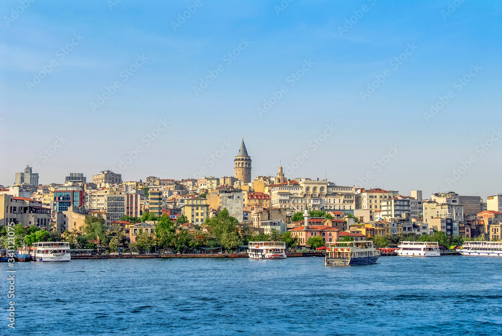 Beyoglu, Istanbul, Turkey, 17 May 2015: Galata Tower, City Lines Ferries, King of Byzantine Anastasius, 528