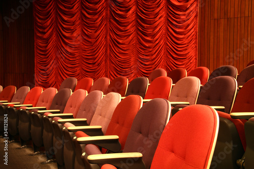 Empty row of seats in a theatre