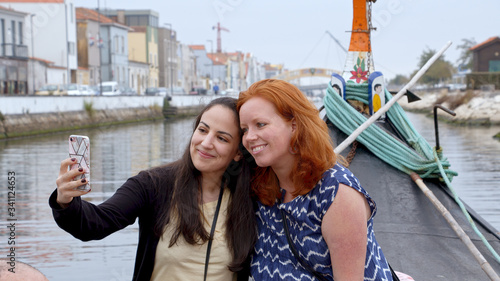 Two young women in the city of Aveiro in Portugal - travel photography